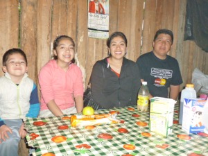 Pastor Josue Martinez Cisneros, President of CICE Disciples, with family at breakfast in a church member's home in the Huasteca Region